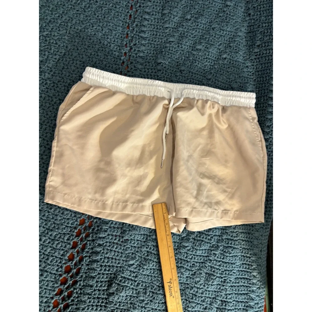 Tan Athletic Shorts with White Elastic Drawstring Waistband and Pockets
